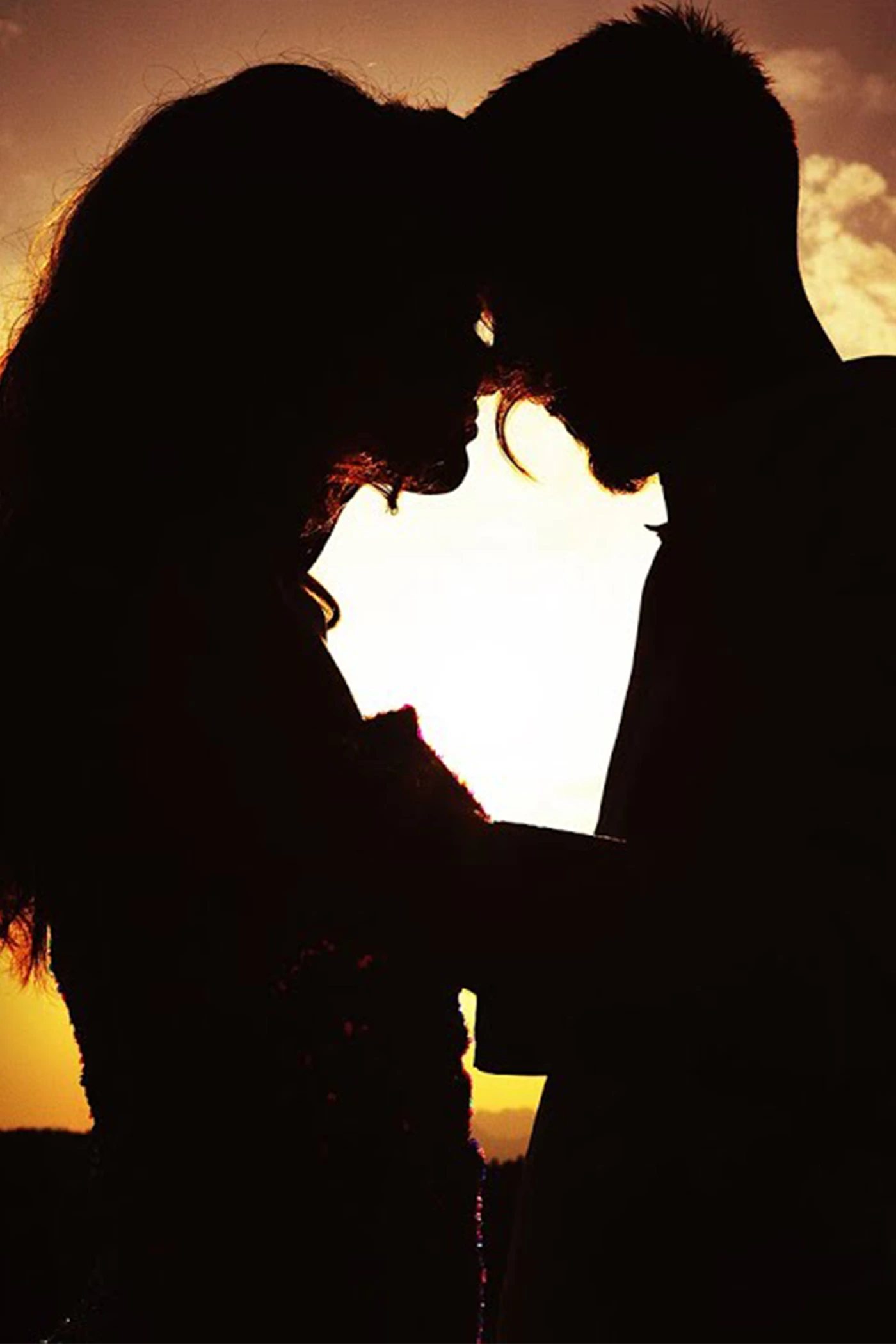 Couple embracing after an argument, symbolizing forgiveness, healing, and lasting love